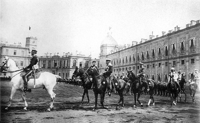            / Grand duke Nikolay Nikolaevich and grades of retinue at the left flank of a regiment